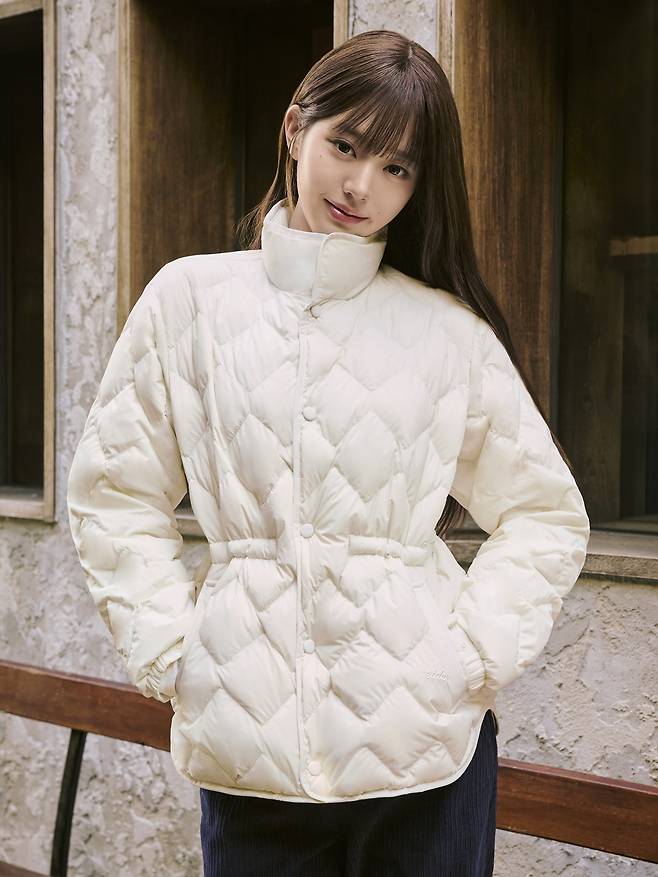 An ivory diamond-quilted jacket.
