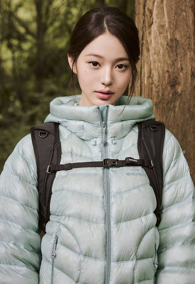 Eider 2026 Fall/Winter Real Hiker campaign — mint down jacket and backpack in a forest