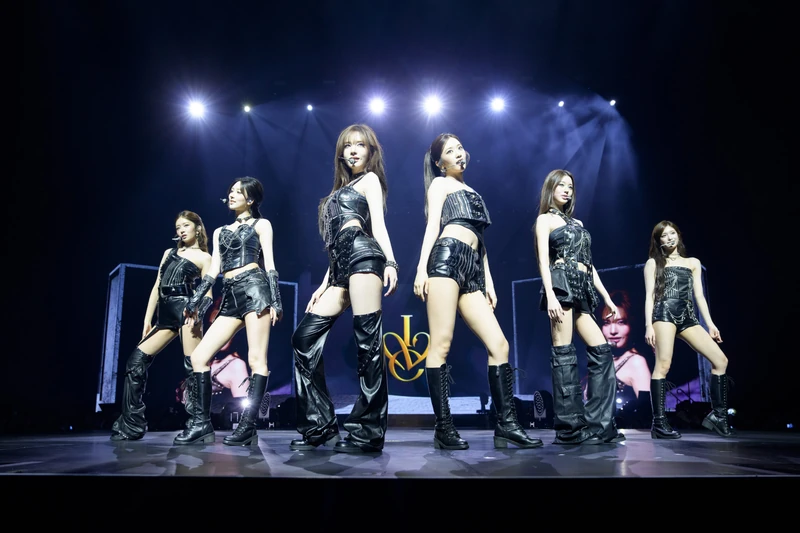 A group performance beneath bright stage lights at Rogers Arena