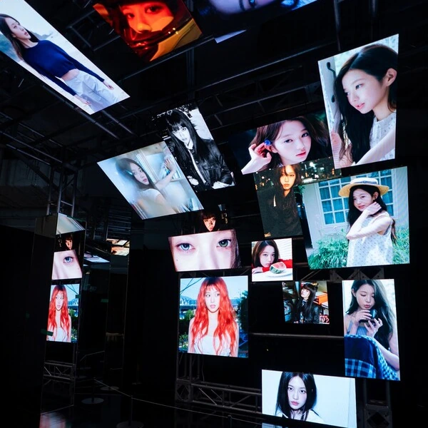 Illuminated photographic displays inside the AN-YOUNG exhibition in Seoul