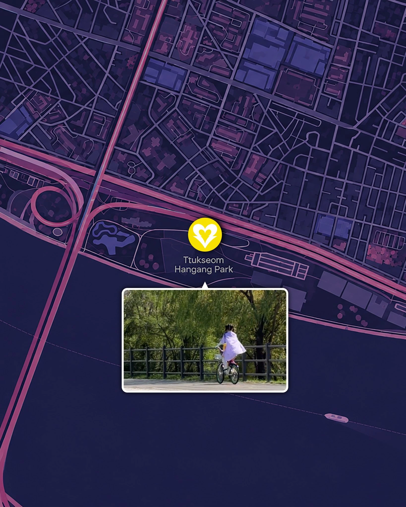 Official Ttukseom Hangang Park map card with a colour-coded heart marker and video still
