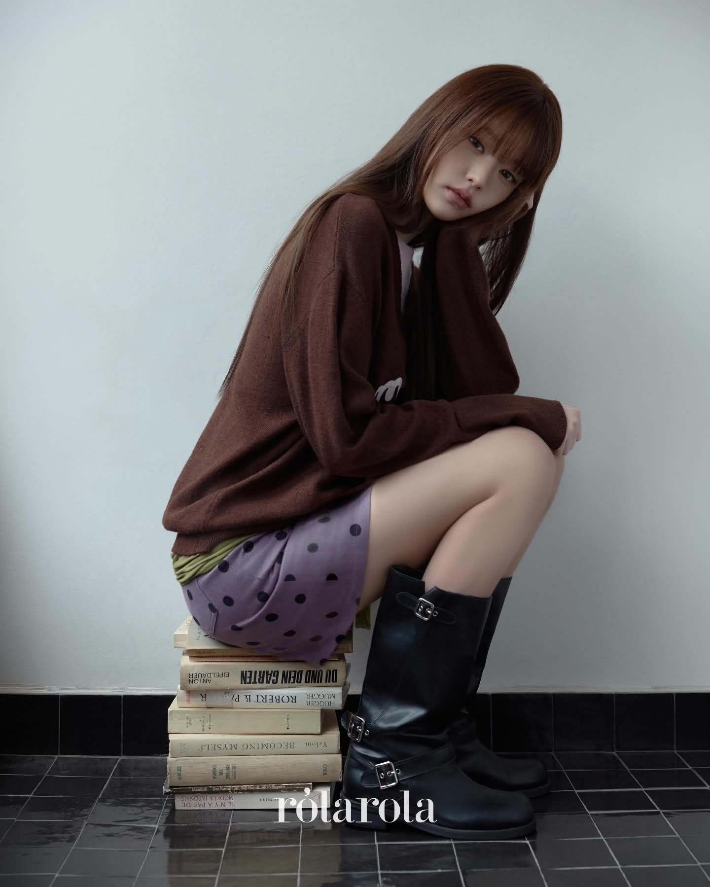 Brown knitwear, polka dots and buckled boots.