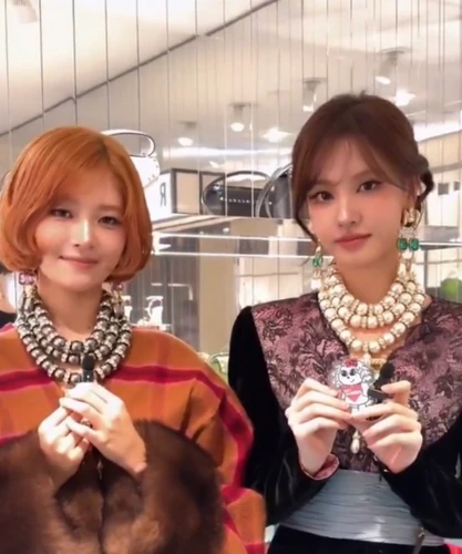 IVE's Rei arrives at Valentino's Rockstud Salon in Ginza during a joint appearance with Liz